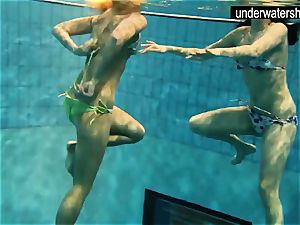 two sexy amateurs showing their bods off under water